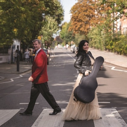 Irina Kulikova and Neil Simon on the famous zebra crossing outside Abbey Road Studios in London during the recording of Christmas at Abbey Road.
